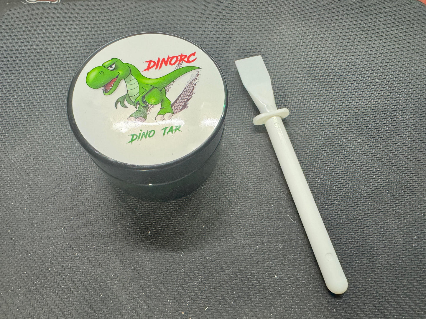 2oz glass jar of Dino Tar